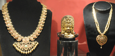 The Mango Mala South India 22K gold necklace, left, was $52,000 at Jewel of the Lotus, Kauai, Hawaii. The Maghul 22K gold necklace, right, was $18,000.