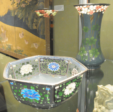 Two pieces of partial plique-a-jour attributed to Ando Jubei, Nagoya, Japan, late Meiji/Tashio period, were displayed at Orientations Gallery, New York City. The bowl was marked $35,000, the vase $38,000.