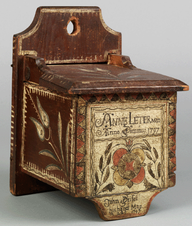 Salt was a valuable commodity. A painted pine salt box made in 1797 for Anne Leterman with a hinged top is decorated on the sides with tulips, has an extended back and a drop that allows it to stand on a table. It was made by John Drissell of Lower Milford Township in Bucks County.