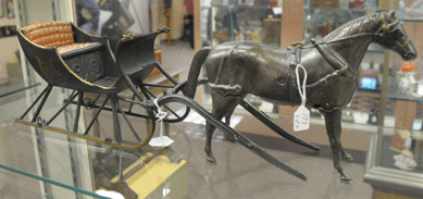 The Ives Cutter Sleigh and Walking Horse exhibited only minor wear to the seat and was cataloged as "one of the most pristine examples known.†Bidding on the lot was brisk, with it selling to Texas collector Steve Scott at $86,250.