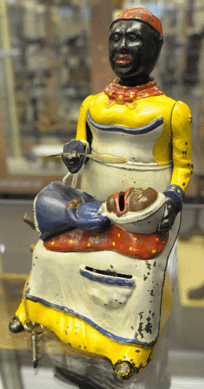 Realizing $51,750, the Kyser and Rex Mammy and Child bank in near-mint condition was the top-selling mechanical bank from the Markey collection.