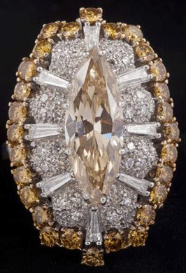 Leland Little has made a serious push into the antique and estate jewelry market over the past four years. Highlights include this large natural fancy-color diamond ring-pendant, $11,213; a diamond solitaire ring, $9,775; and a diamond and sapphire ring, $5,060.