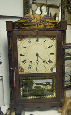 This circa 1830 Eli Terry Jr transitional 30-hour woodworks clock in mahogany case brought $2,587.