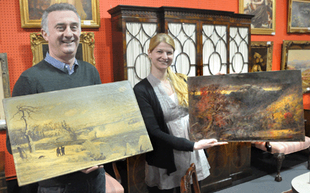 Ronan Clarke and Nelia Moore of Clarke Auction with the two recently discovered paintings by Hudson River School master Jasper Cropsey. Clarke holds the previously unknown "Falls of Niagara,†while Moore holds "Autumn in America†from the artist's first four-seasons series in 1860. The painting was known to exist but unaccounted for the past 150 years. Both paintings, thought to be fakes by the consignor, came from a basement "rec room†where they survived teenage parties, ping pong tables and dart boards. The Cropseys will be auctioned at Clarke's on May 15.