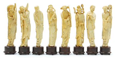 The set of Chinese tinted ivory figural carvings of the Eight Daoist immortals realized $18,960.