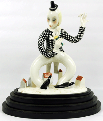 A bidder flew in from Italy to chase two Lenci porcelain figurines. The clown sold to the Italian buyer for $14,950. 