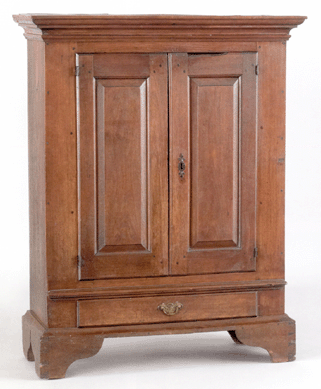 A rare Chester County diminutive walnut linen cupboard, circa 1780, went for $28,440.