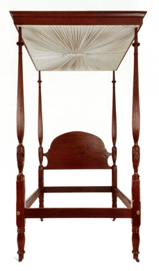 The earliest surviving Louisiana bedsteads are the later Creole examples: Federal forms with French construction. The tall posts, high headboard and stabilizing tester of this circa 1790‱820 mahogany example are typically Creole. Carvings and turnings are Anglo American Federal. Private collection.