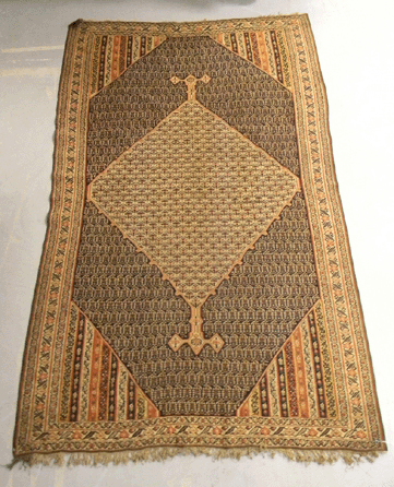 From the Barnes Museum, this antique Senna kilim, 4 by 7 feet, sold for $12,000.