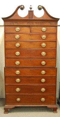 Carving on the Federal mahogany chest-on-chest was attributed to Samuel McIntire. The piece fetched $10,925.