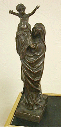 The 10-inch-high bronze of Mary holding the infant Jesus above her head is signed Raphael Lagneau D'apres by Gorham.