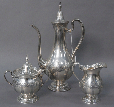 Tiffany sterling creamer and sugar (shown with coffee pot) with etched decoration. 