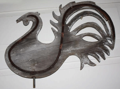 Wooden rooster weathervane with exotic tail by James Lombard.