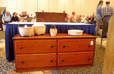 A case of drawers in butternut and pine from the Stranahan collection sold for $18,135. 
