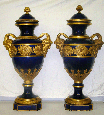 Monumental pair of ormolu-mounted Sevres-style vases, late Nineteenth/early Twentieth Century, that realized $11,300.