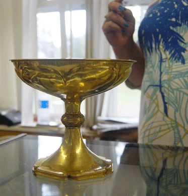 The Albert Cameron Burrage award, an 18K gold cup presented by the Massachusetts Horticultural Society in 1941 to Mrs Galen L. Stone of Marion for the outstanding horticultural exhibit of the year, brought $24,150.