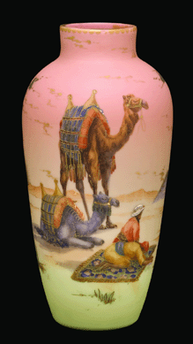 Creating an instant sensation when sent to both President Grover Cleveland and Queen Victoria in 1886 was the Burmese line of vases with delicate salmon pink and translucent yellow colors. Burmese vase with Egyptian scene, Mt Washington Glass Company, circa 1890‱895.