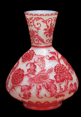 Chinese-style cameo vase thought to have been made by Thomas Webb and Sons, Amblecote, England, circa 1890. European glasshouses, such as Baccarat (founded in 1764), Escalier de Cristal (founded in 1802) and Thomas Webb and Sons (founded in 1837), emulated, in color and form, the carved naturalia imported from East Asia.