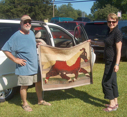 A running horse hooked rug was the best find for Kris and Henry Paul, Lititz, Penn., who were adding to their antiques show inventory.