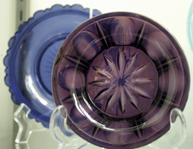 This Bigler amethyst flint glass saucer, 4 inches, Boston & Sandwich, was a highlight in the booth of Ken and Nancy Miller, Morristown, N.J., and noteworthy for its rare color.