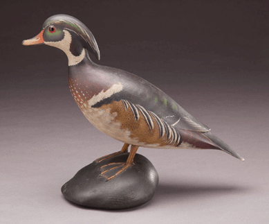 A decorative carving of a wood duck, circa 1915, by Anthony Elmer Crowell was one of three such examples made by the carver and brought $115,000.