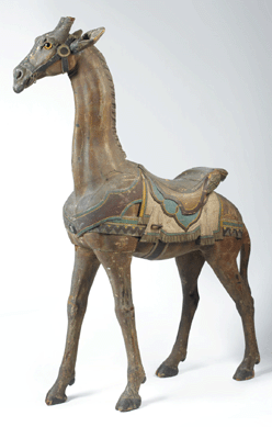 This carved and painted carousel figure of a giraffe, attributed to Daniel Muller working for the Dentzel Company, Philadelphia, late Nineteenth Century, 66 inches high, was estimated at $50/75,000, and sold for $101,480. It opened at $28,000, and the provenance listed Wayne Pratt.