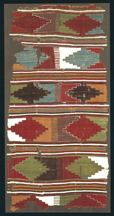 Eighteenth⁎ineteenth Century Anatolian kilim, Turkey, wool, slit tapestry weave, 132 by 71 inches. The Caroline and H. McCoy Jones Collection, gift of Caroline McCoy-Jones.