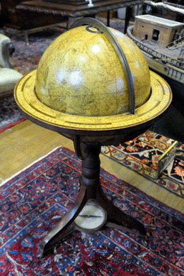 The rare pair of G&J Cary's New Terrestrial globes (one shown) sold for $27,840.