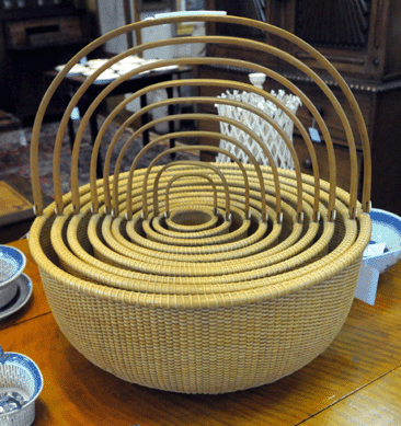 An impressive-looking nest of ten Nantucket baskets by contemporary maker Michael Kane, circa 1985, did well, selling at $12,760.