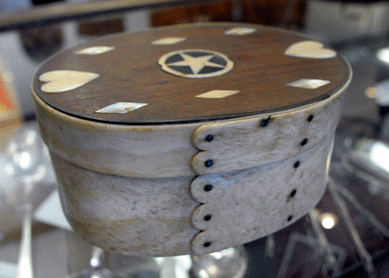 The whale bone and ivory inlaid ditty box was knocked down at $13,920.
