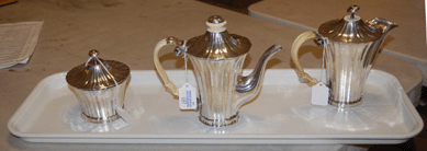 The silver piece tea and coffee server by Josef Hoffmann was $10,350.