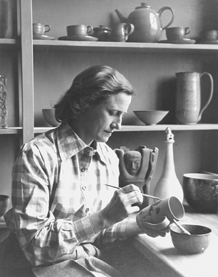 A 1948 silver print portrait of Mary Scheier at work in her studio by Musya Sokolova Sheeler.