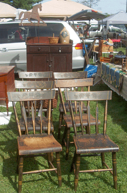 John Kennedy, Troxelville, Penn., offered a set of six painted and decorated chairs and a painted cupboard. ⁍ay's Antique Market