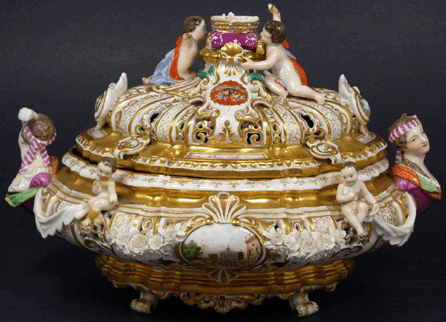 A Nineteenth Century hand painted Meissen reticulated porcelain oval-covered dresser box sold at $14,375.