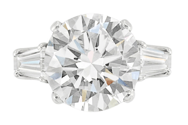 Platinum and diamond ring, round diamond approximately 5.34 carats, H color, VS2 clarity, realized $158,500.