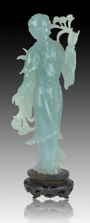 This Nineteenth/Twentieth Century Chinese translucent celadon to pale celadon carved jadeite figure of Guanyin brought $65,000 from the Internet after spirited bidding.