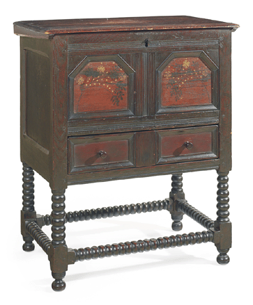 A paint decorated oak, cedar and pine chamber table, Boston, 1690‱710, realized $986,500.