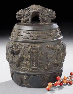 A Chinese cast-bronze bell, dated to the ninth year of Qianlong reign (1749), realized $49,200.