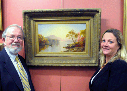 Gene Shannon and Sandra Germain, auction house principals, with the top lot of the sale, Jasper Cropsey's "Greenwood Lake.†The painting, an oil on canvas measuring 12 by 20 inches, sold to a buyer in the room for $252,000.