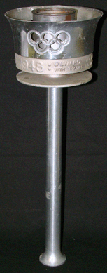This aluminum 1948 Olympic Games bearer's torch, 16 inches tall, inscribed, brought $9,315.
