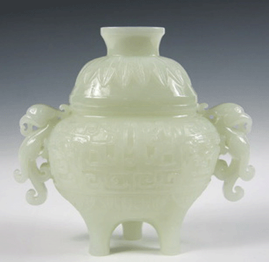 The Chinese white jade covered censer with archaic relief decoration did well, selling at $14,950.