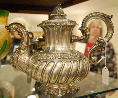 The early English teapot with a dolphin spout brought $690.