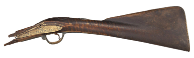 This Revolutionary War musket remnant, circa 1740‶0, inscribed "For Capt Edward Roggers,†19 inches long, achieved $25,000.