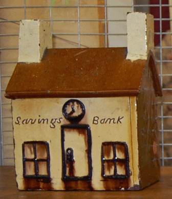 The Pennsylvania redware bank sold for $1,223. 