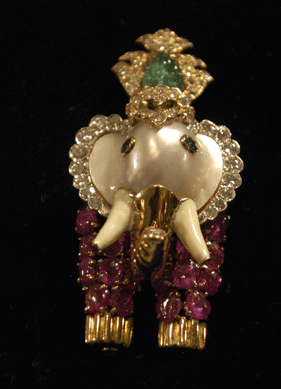 A beauty in the booth of Brad Reh, Southampton, N.Y., was this rare David Webb elephant brooch, made with emeralds, rubies and diamonds and a pearl for the elephant's head.