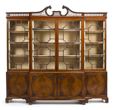 A George III carved mahogany breakfront bookcase, attributed to William Vile, third quarter Eighteenth Century, 84 inches tall, went out at $62,500.