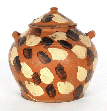 This earthenware sugar bowl was a rare Alamance County, N.C., piece originally bought by Titus Geesey from Joe Kindig Jr in 1930. The phone was active on this bowl bringing it to $37,920.