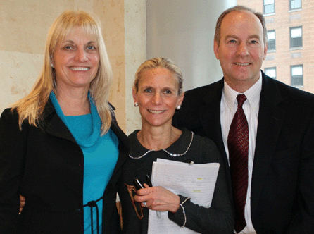 Betty Ring's daughter, Loretta Ring Britton, left, and Phillip Giles, flank Nancy Druckman, head of the American folk art department at Sotheby's.