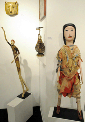 The Possum Trot figure that once created a folk art environment in the Mojave Desert, Calif., right, made by Calvin and Ruby Black was $50,000 at American Primitive Gallery, New York City.