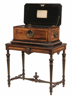 Making sweet music was a Swiss six-song cylinder music box on matching stand, with the box by Ami Rivenc & Co., Geneva, dated 1878, that sold for $23,000.